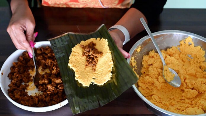 preparing alcapurrias de yuca