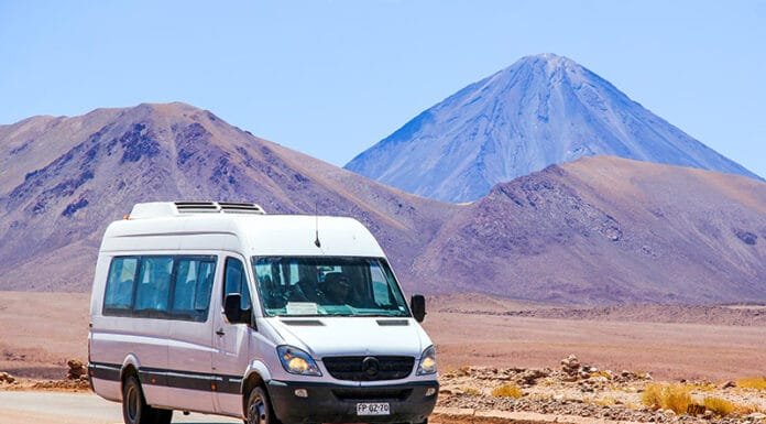 How to Rent a Van Without Breaking the Bank on Your Travels How to Rent a Van Without Breaking the Bank, ANTOFAGASTA, CHILE - NOVEMBER 16, 2015: White minibus Mercedes-Benz Sprinter at the background of a volcano.