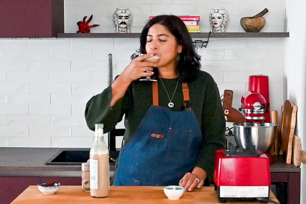 Coffee Coquito Recipe Jessica sipping Coquito